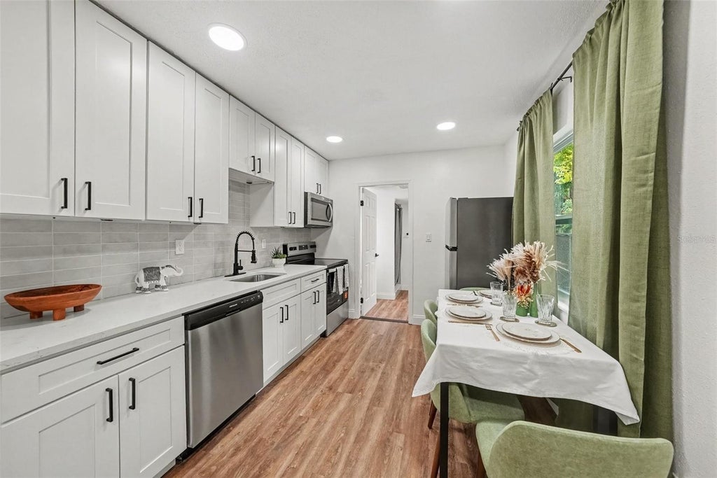 Photo of 1228 56th Avenue N, St Petersburg, FL 33703 (MLS # TB8562927)