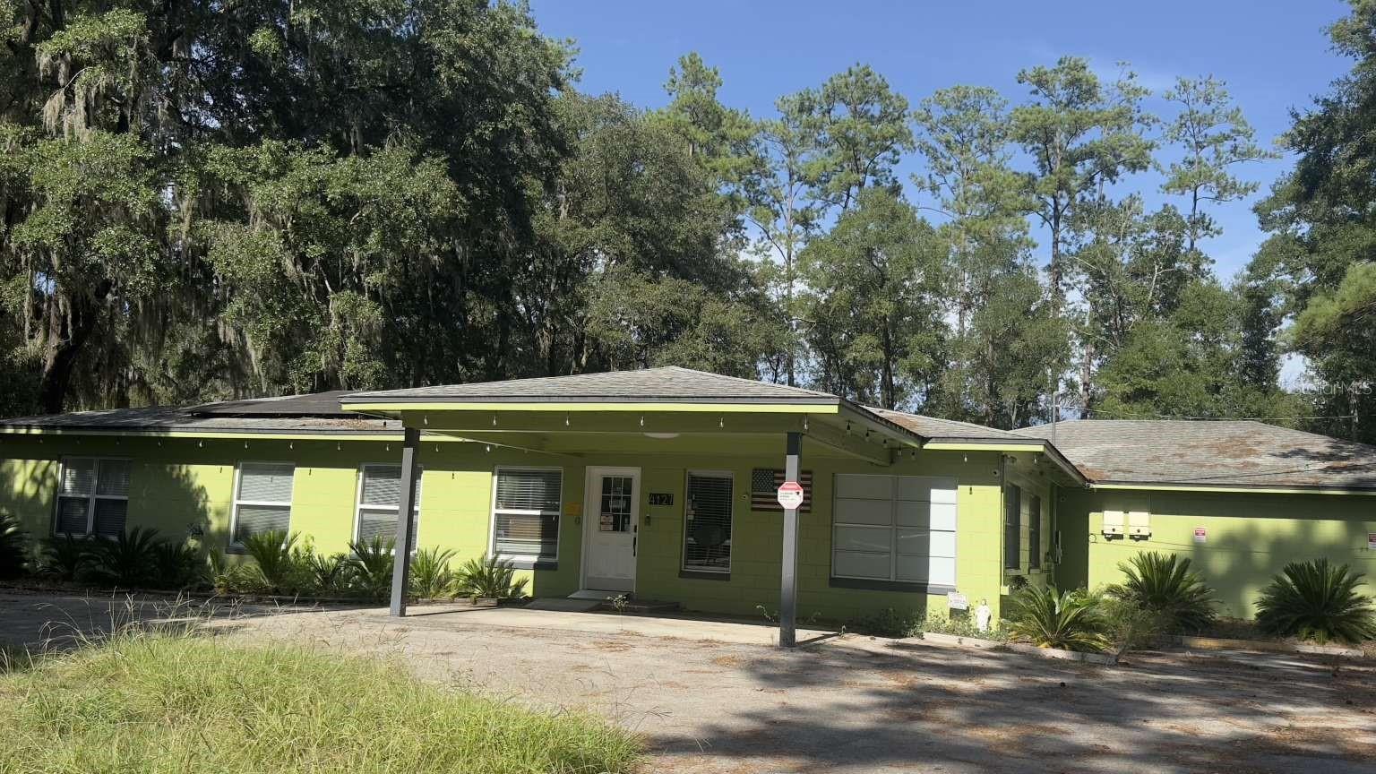 2.05 commercial lot with two buildings & a total of 6000 square feet of space. Previously used as a preschool & indoor playground.