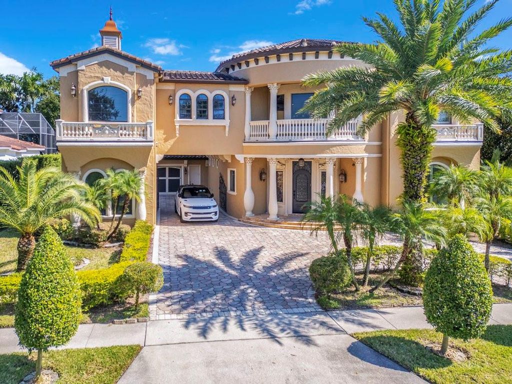 Photo of 5750 Emerington Cres, Orlando, FL 32819 (MLS # O6356206)