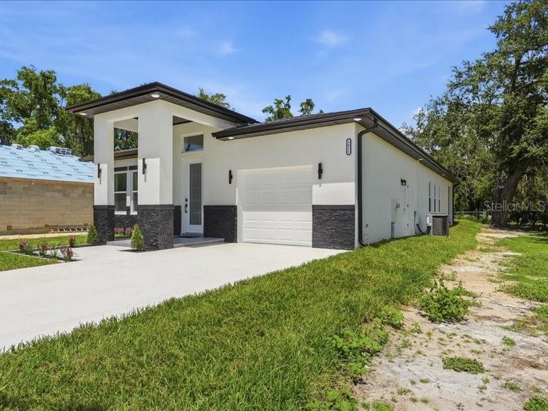 Photo of 2011 Recker Highway, Winter Haven, FL 33880 (MLS # TB8545235)