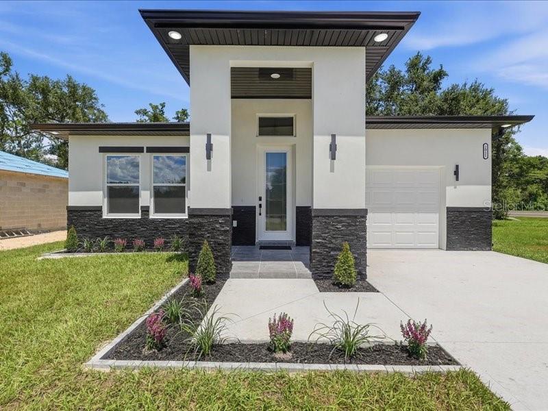 Photo of 2011 Recker Highway, Winter Haven, FL 33880 (MLS # TB8545235)