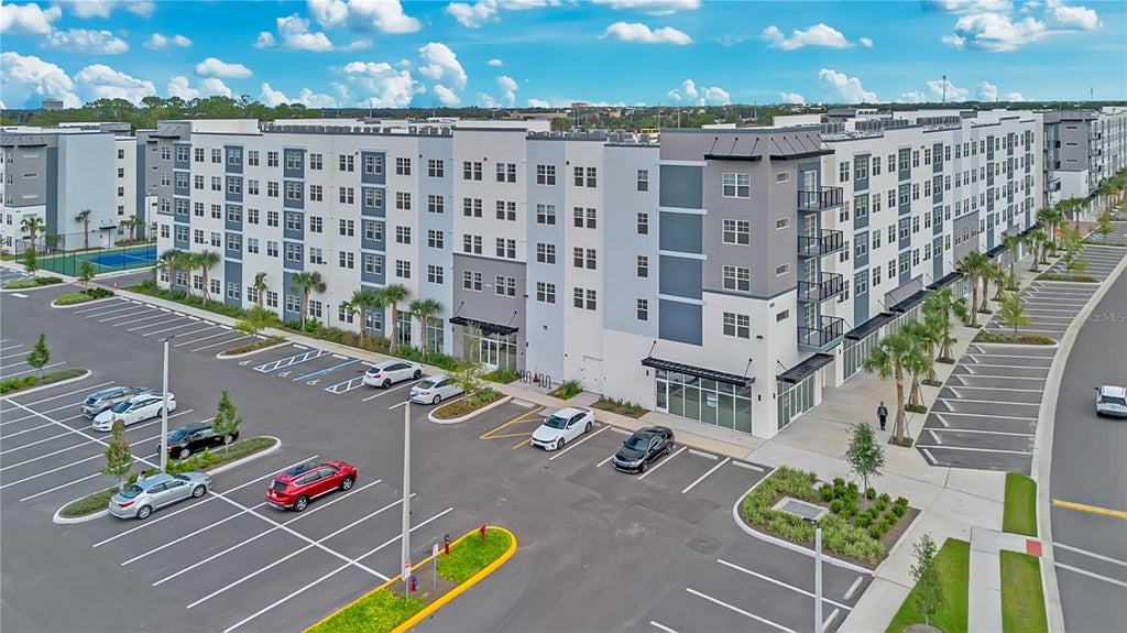 Photo of 5563 Millenia Park Blvd #224, Orlando, FL 32839 (MLS # O6448309)