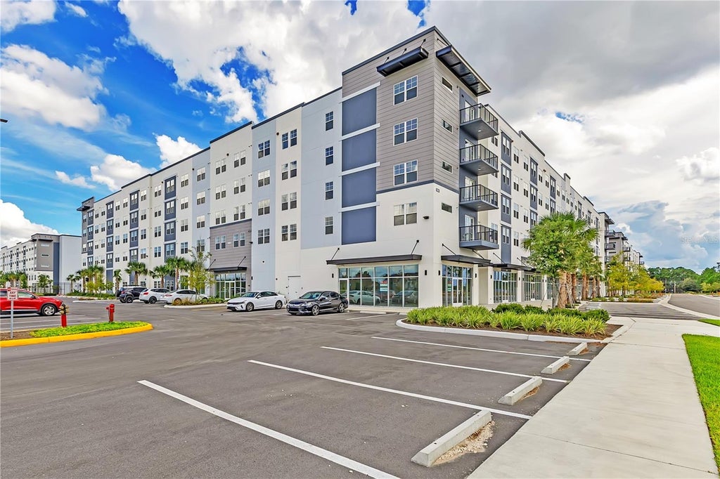 Photo of 5563 Millenia Park Blvd #224, Orlando, FL 32839 (MLS # O6448309)