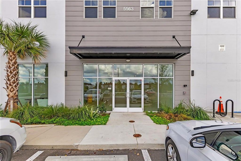 Photo of 5563 Millenia Park Blvd #224, Orlando, FL 32839 (MLS # O6448309)