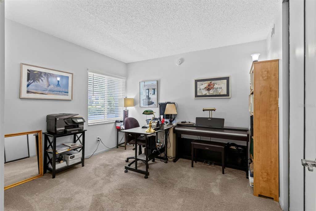 Photo of 11 Escondido Circle #102, Altamonte Springs, FL 32701 (MLS # O6434719)