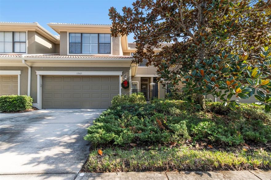 Welcome to this stunning 2007-built townhome in the desirable Beacon Trace community, offering the perfect blend of luxury, convenience, and low-maintenance living with block construction and tile roof. This spacious residence features a beautifully landscaped courtyard entrance,  3 bedrooms and 3.5 bathrooms, complete with an attached 2-car garage. The highly sought-after floor plan places the secluded Primary Suite on the main floor and en-suite with large walk in closet, separate soaking tub and shower and dual vanity.  The upstairs boasts a Secondary Suite, an additional guest bedroom, and a large, versatile loft area, making it ideal for guests, an office, or an entertainment zone. Step out onto your private, screened lanai and enjoy the tranquil view of the pond framed by luscious, mature landscaping. Additional premium perks include Plantation Shutters throughout, a generator for peace of mind, a convenient inside laundry room, Custom hurricane panels stored in the garage and a water softener system.  The HOA covers exterior maintenance, insurance, roof reserves, and pest control.  The convenient location is close to the Gulf Beaches, shopping, restaurants, the Southwest Rec Center and Largo Golf Course.  This home is an absolute must-see for those seeking a stylish, comfortable, and well-equipped lifestyle in a fantastic location!