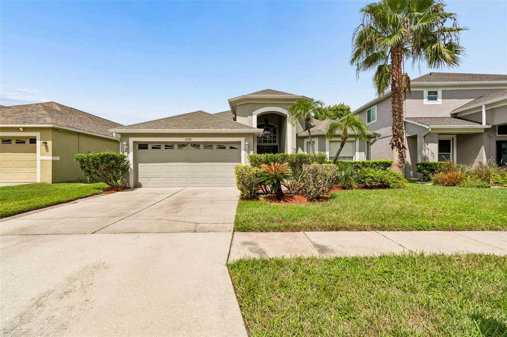 Photo of 19308 Sandy Springs Circle, Lutz, FL 33558 (MLS # TB8536640)