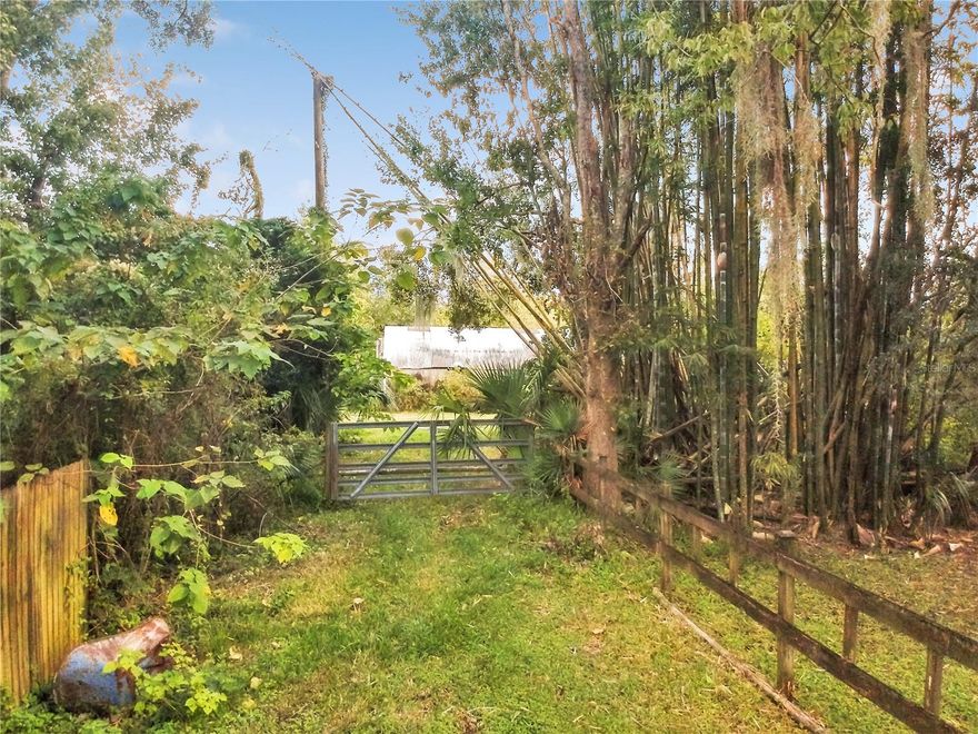 Plant City picturesque acreage, 4.29 acres of prime land! This stunning property zoned R-1 offers many possibilities. Build your dream home surrounded by lush greenery, with plenty of room for a pool, garden, and storage facilities. Plant City Zoning permits additional residential development with the potential for up to 12 units per acre with required lot sizes of 60 x 100.  Property was once a thriving nursery with greenhouses, pond, and water moat.  Please check with Plant City Zoning for information on nursery usage.  Enjoy rural living with easy access to I-4 and the Central Business District of Plant City. Water and Sewer is available in the area for connection. Currently under well and septic. Age and condition of septic and well is unknown.  Seller is an investor and has not personally occupied the property. Follow English St to the gate of the property.