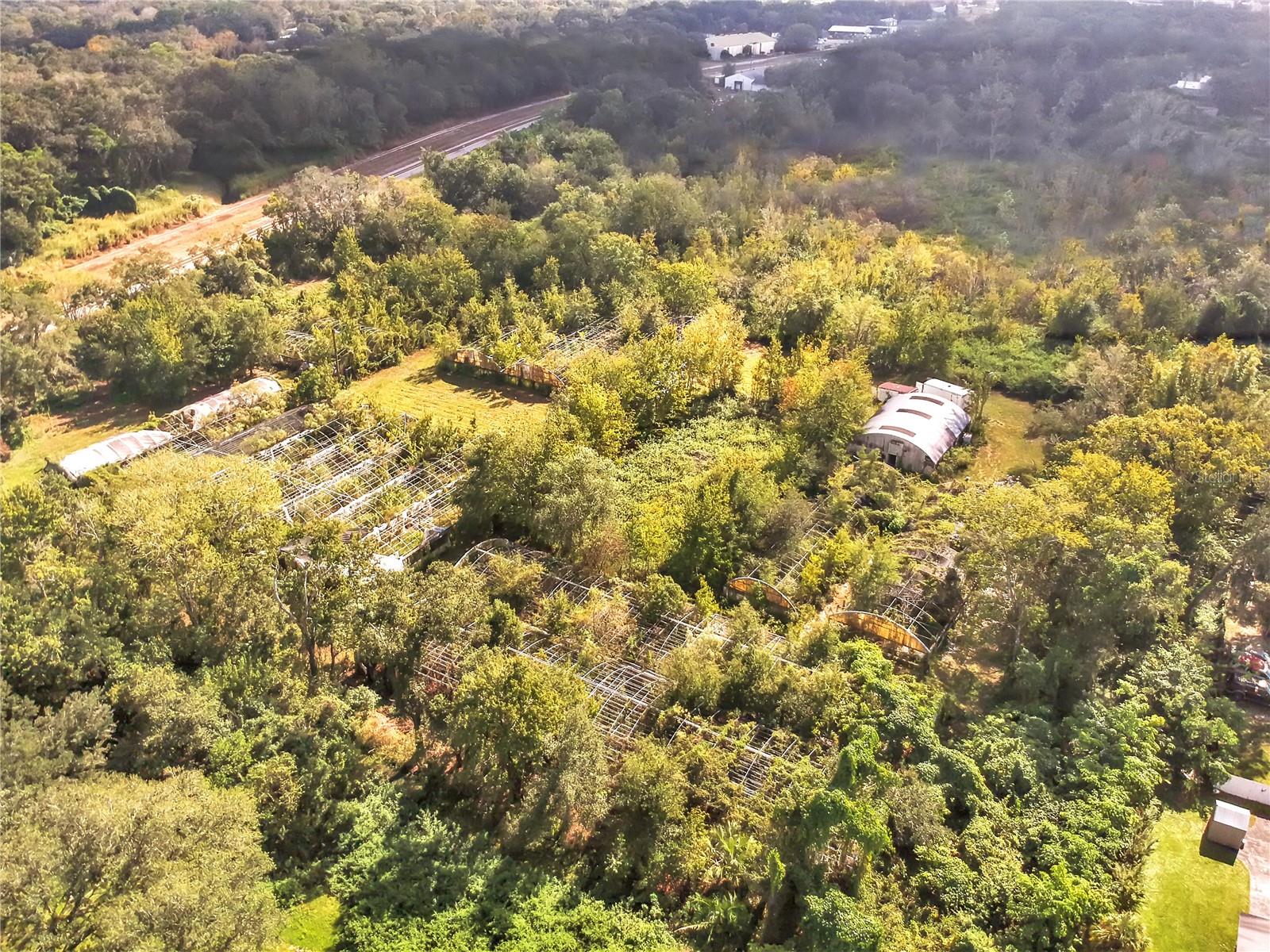 TRASKS ADD TO PLANT CITY - Land