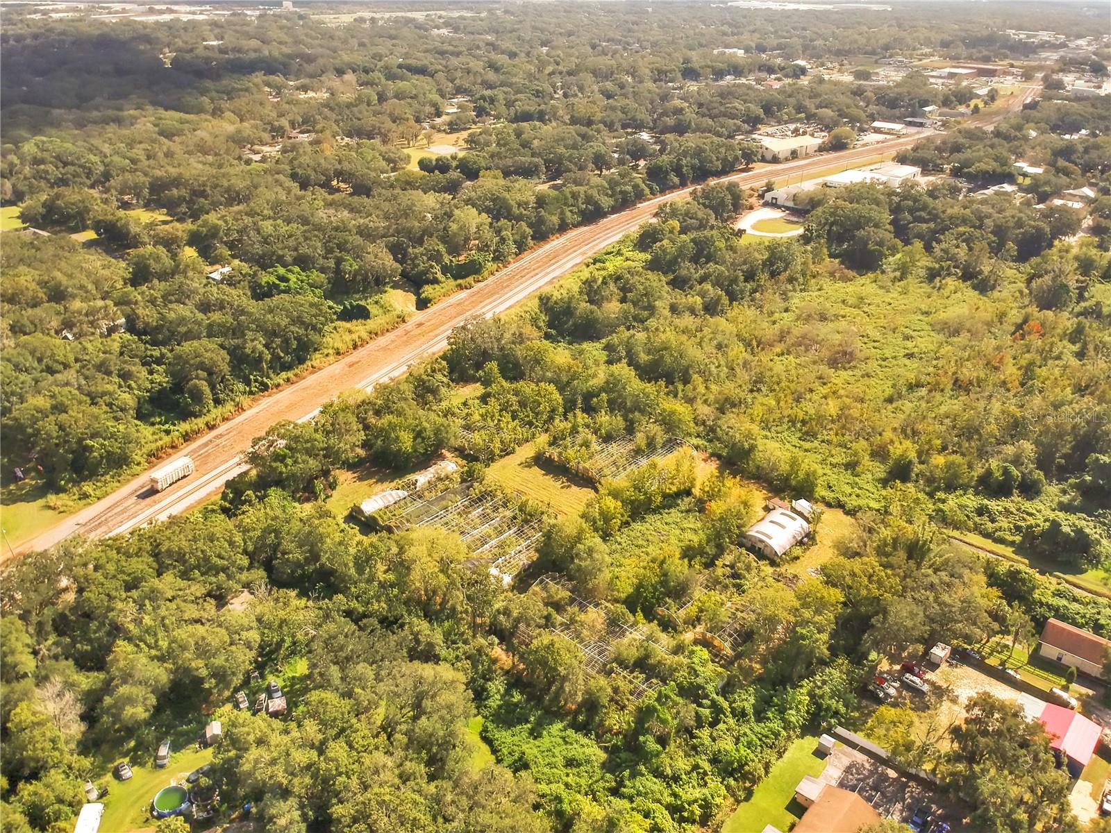 TRASKS ADD TO PLANT CITY - Land