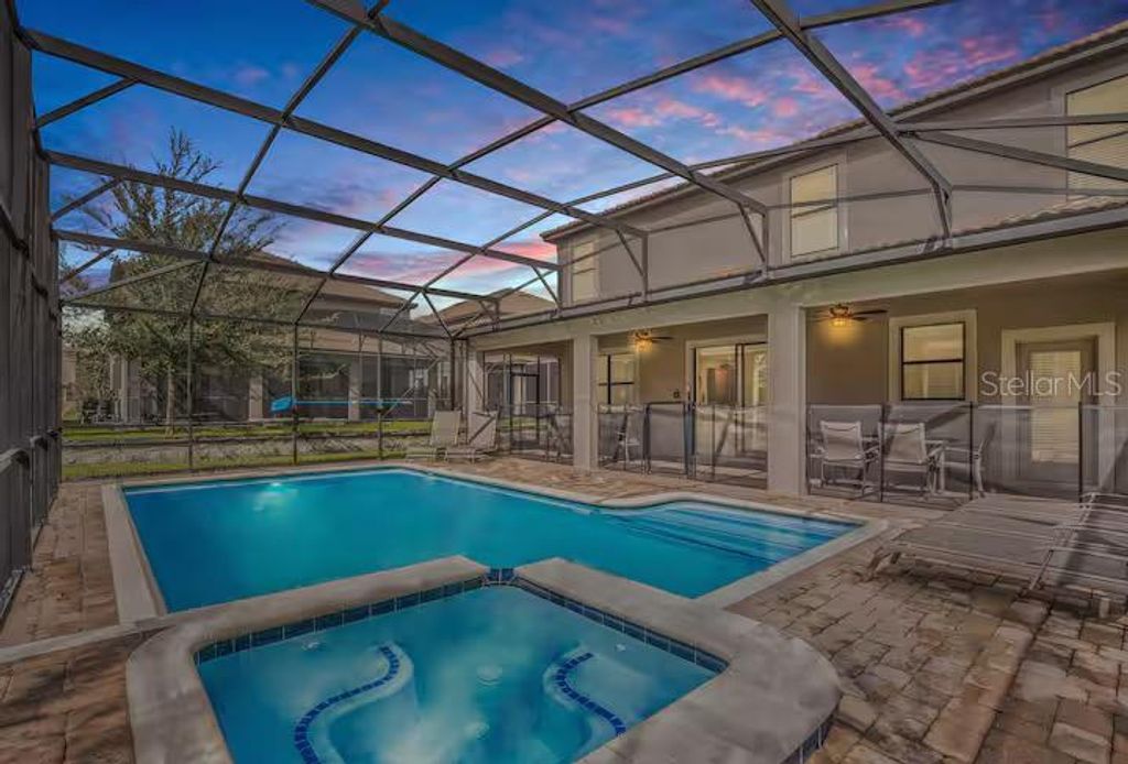 Photo of 1454 Belle Terre Road, Davenport, FL 33896 (MLS # TB8516738)