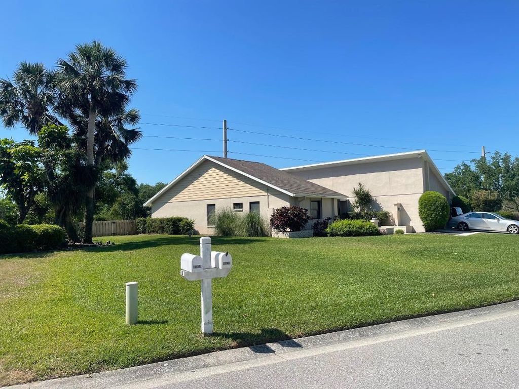 Photo of 3799 Countryside Road, Sarasota, FL 34233 (MLS # A4643824)