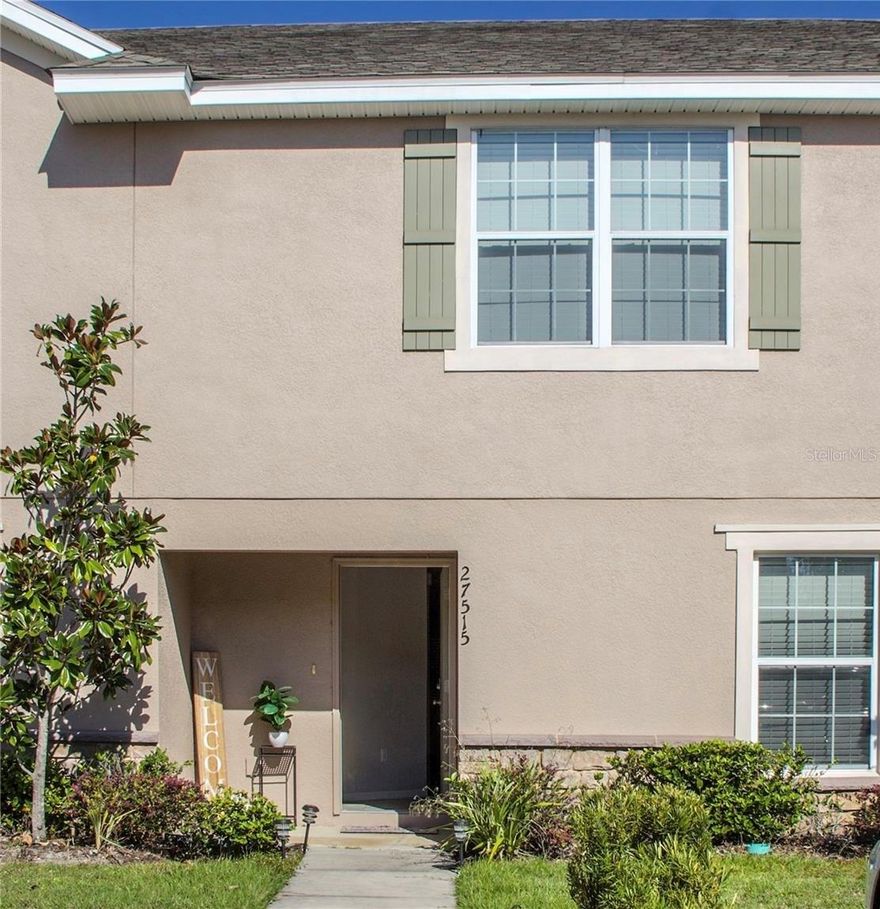 A large 4-bedroom townhouse located in a highly desirable and prime location. This home features an open floor plan designed for entertaining, a kitchen with granite countertops, stainless-steel appliances, and abundant dark coffee cabinets for storage, along with a breakfast bar perfect for casual meals and conversation. Ceramic tile flooring runs throughout the first floor, offering easy maintenance and convenience. Enjoy a nicely sized screened-in patio off the living room, providing an inviting outdoor space under a full screen enclosure. One bedroom is conveniently located on the first floor, while the primary suite and two additional bedrooms are upstairs. A laundry room and spacious hallway provide privacy and separation between bedrooms. This gated community offers a resort-style pool, and the low HOA includes water, grounds maintenance, and trash. Conveniently located near I-75 and SR 54, and just minutes from The Grove shopping area, dining, and entertainment. Excellent location—don’t miss the opportunity to view this home and make it yours.