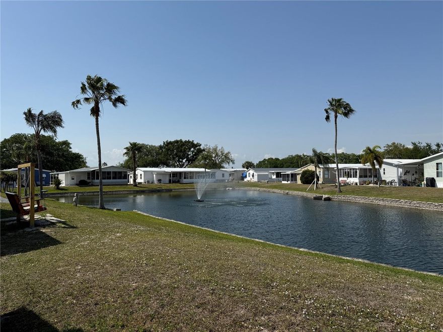 New Price, Same Opportunity! Welcome to 215 S Port Royal in Apollo Beach, where opportunity knocks with this affordable THREE-bedroom, TWO-bath manufactured home. The guest bathroom has already been updated. If you’ve ever dreamed of putting your own personal touch on a home, this is your chance to make it happen. PRICED TO SELL, this property offers the perfect canvas to create your Florida dream retreat.  Step outside to your backyard oasis and take in the peaceful view of the POND, complete with a beautiful fountain that adds a touch of tranquility to your day. Whether you’re sipping your morning coffee or unwinding in the evening, the calming sound of the water will make you feel right at home.  Located in Caribbean Isles Residential Cooperative, an active 55+ manufactured home community, you’ll never run out of things to do. The community is known for its vibrant social scene and a wide range of amenities designed to keep you active and engaged. Whether you enjoy group activities, crafts, games, or just relaxing by the pool, there’s always something going on.  The location couldn’t be more convenient. Just down the street, you’ll find popular spots like First Watch for breakfast, Starbucks for your coffee fix, and Publix for groceries. A new Walmart and Aldi are coming soon, giving you even more options. For your healthcare needs, TGH Urgent Care and CVS are just minutes away.  This home is perfect for someone ready to take on a project and make it their own. With some TLC, you can transform it into a cozy and comfortable space tailored to your tastes. Embrace the opportunity to invest in your future while enjoying all the comforts of a welcoming community and the convenience of nearby amenities.   Don’t miss your chance to own a piece of Apollo Beach at an incredible value. Bring your ideas and your vision — this is your opportunity to create the home you’ve always wanted. Schedule your showing today and see the potential for yourself!
