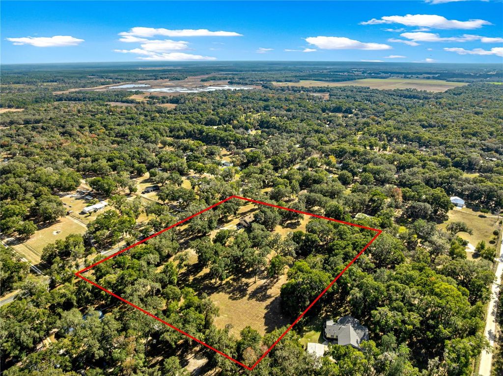 Photo of 13850 NE 47th Avenue, Anthony, FL 32617 (MLS # OM715447)