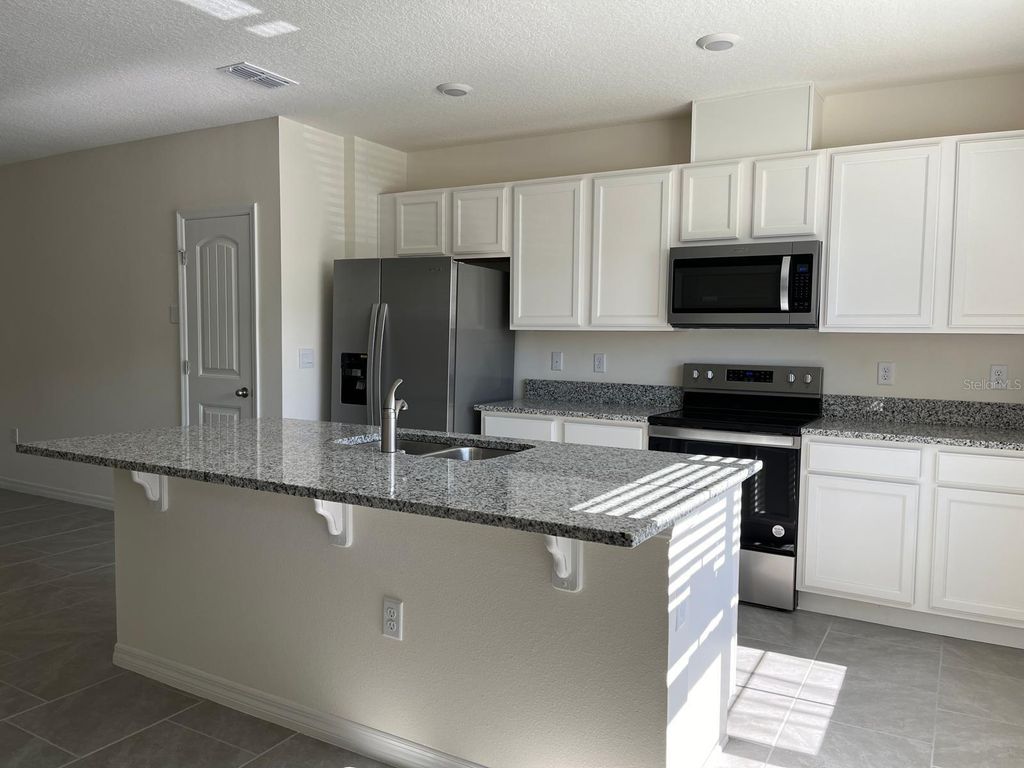 Photo of 13323 Pontoon Road, Winter Garden, FL 34787 (MLS # S5147574)