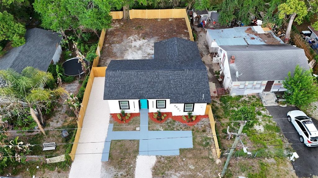 Photo of 9407 N 12th Street, Tampa, FL 33612 (MLS # TB8503101)