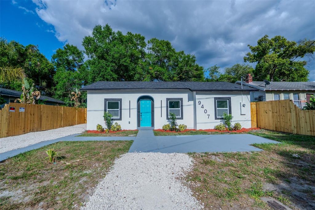 Photo of 9407 N 12th Street, Tampa, FL 33612 (MLS # TB8503101)