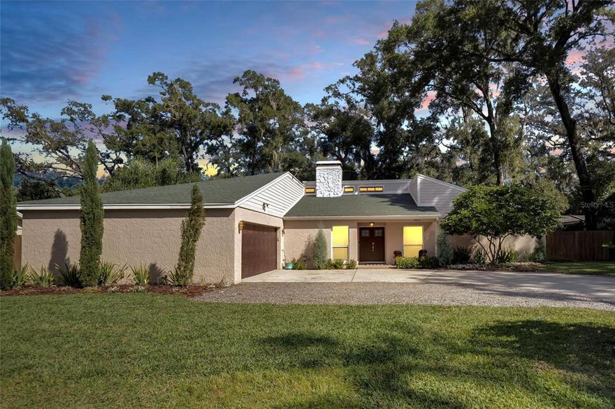 Renovated beauty in Lithia Oaks, an established, tree-lined community in Valrico.  Are you tired of cookie cutter homes on tiny lots?  Your search is over!  This unique home has both character and style, and is situated on a lovely 1/3 acre lot.  This floorplan offers formal living and dining rooms as well as a large family room off the kitchen.  Architectural features, a double sided fireplace, and skylights add to the appeal.  Two of the lanais have been enclosed to add more functional space, currently utilized as an office and workout area.  Both are air conditioned.  The kitchen features updated cabinetry with soft close drawers and built-in pantries, granite countertops, and quality appliances including a double oven.  The extended size offers space for a cozy coffee corner and dining area.  The family room is spacious with cathedral ceilings and fireplace.  Skylights and a bank of windows provide natural light to the rooms.  The master bedroom has an en suite bathroom that has been tastefully renovated.  It has an oversized walk-in closet with built-ins for easy organizing.  The split bedroom plan has three additional bedrooms adjacent to the second bathroom which has also been renovated.  The large laundry room has abundant cabinetry with washer and dryer.  The garage is every handyman's dream with lots of cabinetry, shelving and air conditioning!  Be comfortable when you work on those projects.  The backyard is nicely landscaped, fenced, and has a shed to store your toys and equipment.  Improvements and updates include roof, windows, kitchen, bathrooms, flooring and portable generator.  Convenient location just off Bloomingdale Ave.