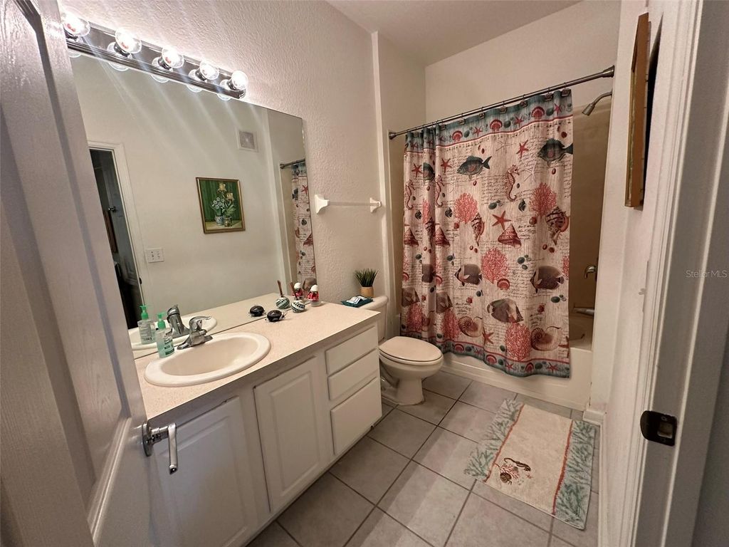 Photo of 8710 Saratoga Inlet Drive #207, Orlando, FL 32829 (MLS # S5147505)