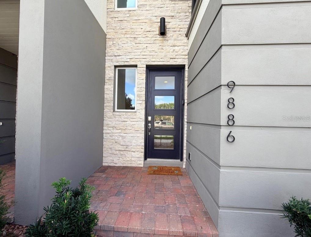 Photo of 9886 Bucklow Hill Drive, Orlando, FL 32832 (MLS # O6441277)