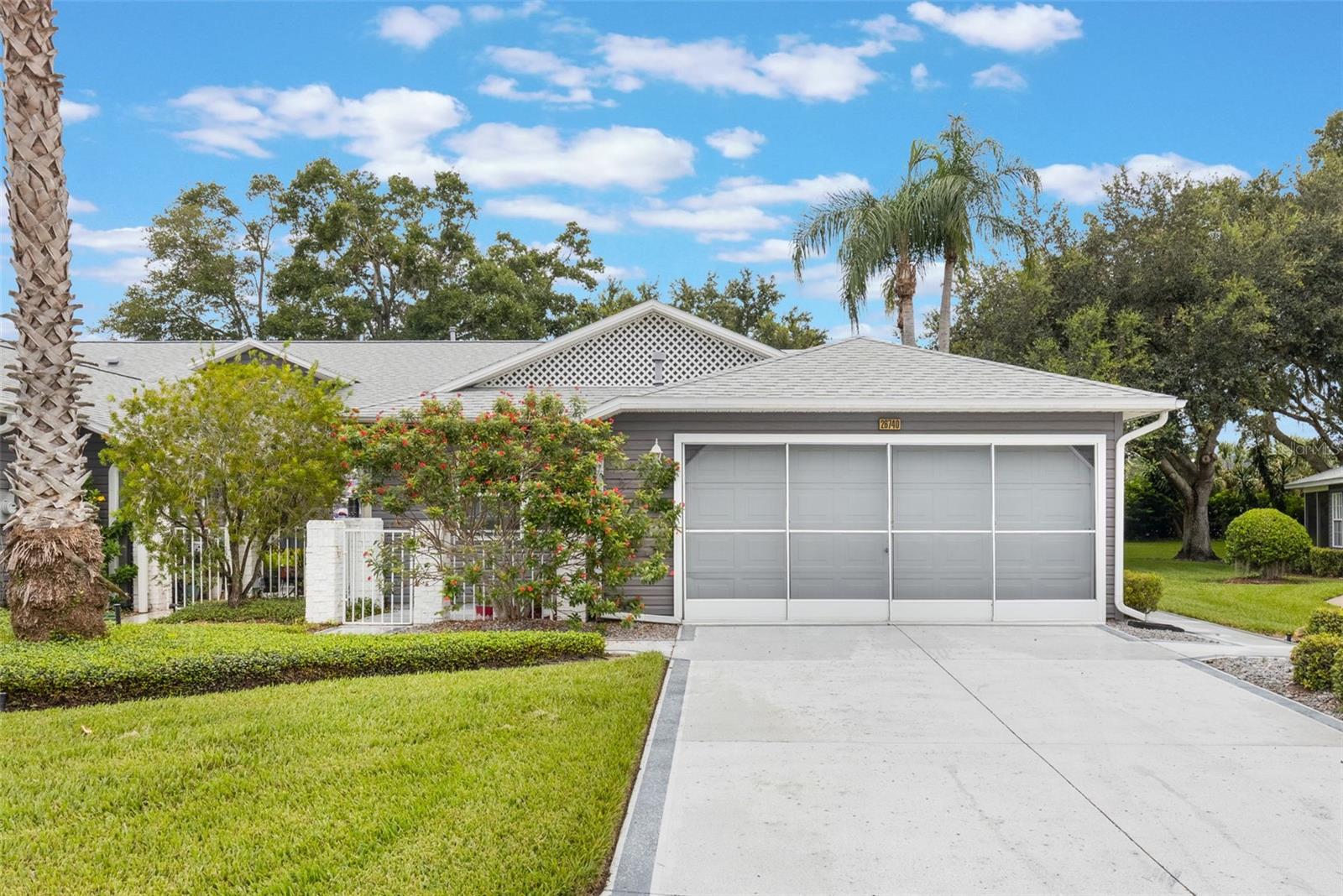 BRAND NEW OFFERING, Beautiful Loved and Well Maintained, End Unit Villa, in Highland Lakes, Luxury 55 + Community. Home has open floor plan, 2 Bedrooms, 2 Full Baths, 2 Car Garage, Custom Garage Screen, Epoxy Floor, Work Bench, Attic Storage, Custom Concrete Drive and Walk Way to side of Home. Roof (2021). Home can be offered with Furniture Shown, and Golf Cart-Outside of Contract. Villa boasts High Ceilings, Formal Dining Room, 2 Separate Lanais, One Screened, One with Windows and Roof Cover, Lots of Natural Light. Bright Kitchen, Stove, Refrigerator, Microwave, And Dishwasher. Eating Space In Kitchen! Spacious Primary Bedroom, Ensuite Bath, Stall Shower, Walk In Closet, Linen Closet. Guest Bedroom with Large Closet, Full Bath with Tub and Shower. Double Slider to Lanai. Highland Lakes offers a Community that engages in endless amenities including: 2 Pools, One Indoor and One Outdoor. A Billiard and Ping Pong Room, a Ball Room including a Stage which Hosts Member Activities and Entertainment. Fitness Center, Craft Room, Library, Catering Kitchen, Game and Meeting Rooms. Outdoor Activities include a Beautiful Golf Driving Range, Walking Trails, Lighted Tennis Courts, Softball Field, Bocci Ball, Shuffle Board, Pickleball, Fishing Ponds for Catch and Release, Covered Pavilions With Grills to Enjoy Your Florida Sunshine Picnics. The Best Part is the Tool Shed Where Members Can Enjoy the Camaraderie, Combined Skills for Repairs, Wood Working Not To Mention an Extensive Machine Shop. The Annual Lunch The Guys Prepare for Everyone is Not to Miss!! Call Today To Schedule Your Private Showing!