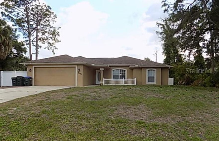 This move-in ready, well-maintained 3-bedroom, 2-bathroom block home with an additional den offers 1,596 square feet of comfortable living space. Featuring vaulted ceilings and ceramic tile throughout the main living areas, the home feels both open and inviting. Enjoy Florida living with your own private pool, complete with a convenient pool bath, and a fully fenced backyard for added privacy. Located in North Port, this property combines functionality and relaxation in a desirable setting.