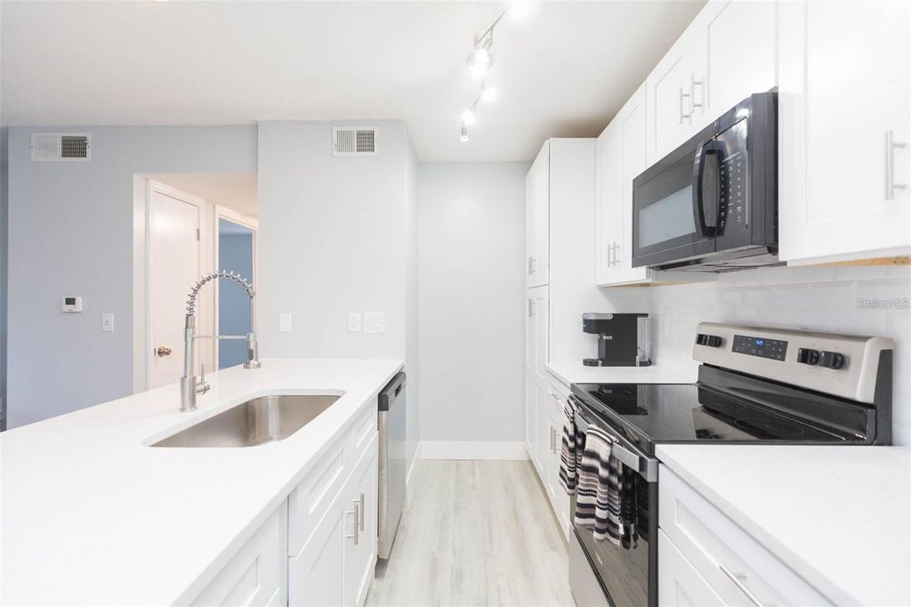 Photo of 4211 Chatham Oak Court #107, Tampa, FL 33624 (MLS # TB8429057)