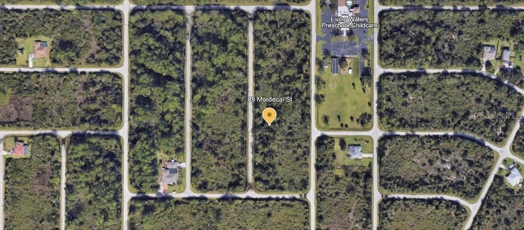 Photo of 88 Mordecal Street, Port Charlotte, FL 33953 (MLS # K4903844)
