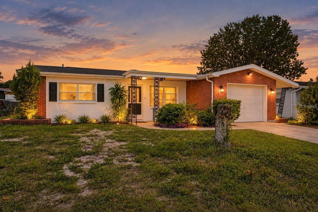 Photo of 8340 Redfield Drive, Port Richey, FL 34668 (MLS # W7890780)