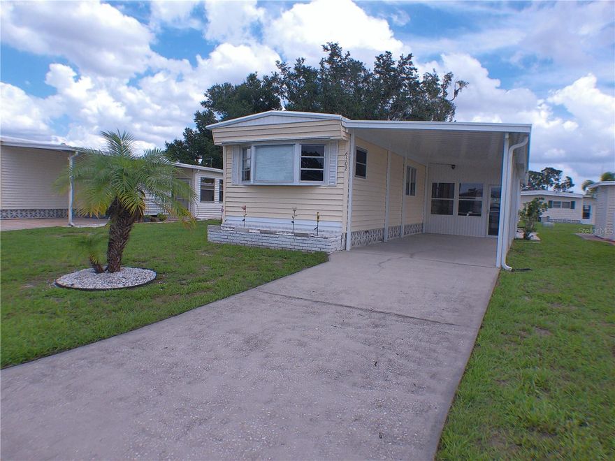 Welcome to 6502 Hikina Drive in North Port, Florida — nestled in the desirable Holiday Park 55- plus community, where you OWN THE LAND
This charming, fully furnished two-bedroom, one-and-a-half-bath home offers bright living spaces filled with natural light.
The cozy living room is perfect for relaxing, and the crisp kitchen features a stylish backsplash and plenty of cabinet space.
Both bedrooms have the feeling of comfort and flexibility — ideal for guests or a home office — with beautiful flooring throughout. You will have plenty of storage in the workshop and EXTRA SQ FOOTAGE UNDER AIR/HEAT in the 10x20 Florida Room/Lanai which has vinyl windows, Bamboo blinds and a splitter AC to keep it nice and cold during your summer entertaining after a long day at one of the 2 pools or near by beaches. MOTIVATED SELLER!!!
You’ll appreciate the convenient laundry and bonus area, plus a newer roof, air conditioning, and water heater.
Holiday Park residents enjoy a gated community with two pools, clubhouse, tennis, and social activities — all for low annual fees.
This home is move-in ready and well maintained. This very popular park  offers 2 pools, pickleball, shuffleboard, Bocce courts and a fitness center in the Heart of North Port. Walking distance to shopping. Very active park with lots of amenities to keep you busy and engaged in the community. The seller has it treated for insects by Terminix quarterly. 
Water Heater 3 yrs old and re-piped, Roof was replaced in 2014, AC is regularly serviced and is 2016.Mold and leak detection has been done and is clear.
With just a 15-20 min drive to local beaches and Malls. Wellen Park offers great shopping a dinning as you watch an ATLANTA BRAVES GAMES.
HOLIDAY PARK offers Storage for boats, campers and trailers available.(extra fee) So many activities to keep you busy with plenty of card games and parties! Park Application and approval is required with a $50 application fee. One owner must be 55 yrs or older and the other 45yrs or older.