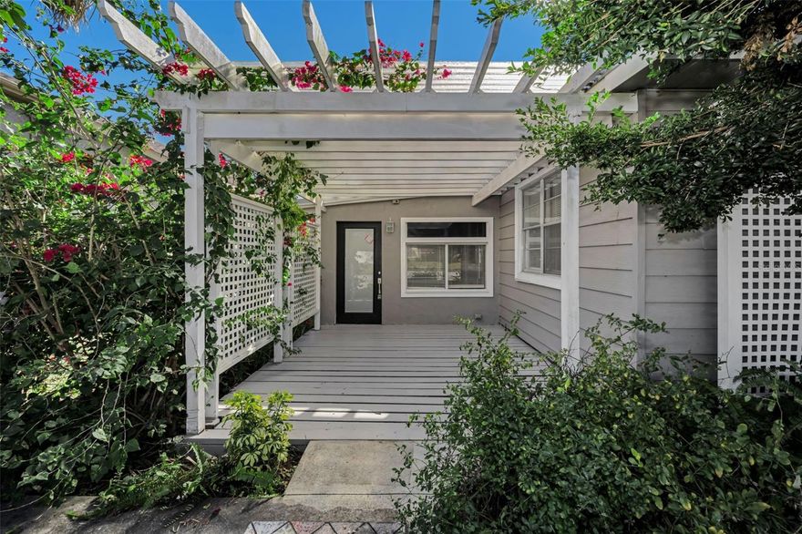 One or more photo(s) has been virtually staged. Enter this charming home with front deck. Light and bright with skylights, cozy fireplace and wood floors throughout. Updated kitchen with Lazy Susan, Granite countertops, tile backsplash and newer cabinets.  Pergolas climbing plants to provide shady. French doors lead to fenced back yard with tropical back deck & shed. Newer properties beside and in the back of the property. Lake Tarpon area with the lake at the end of the street but not in a flood zone. Close to Anderson Park, Sponge docks, Sunset Beach, Howard Park beach along with restaurants, shopping and more! A must see!