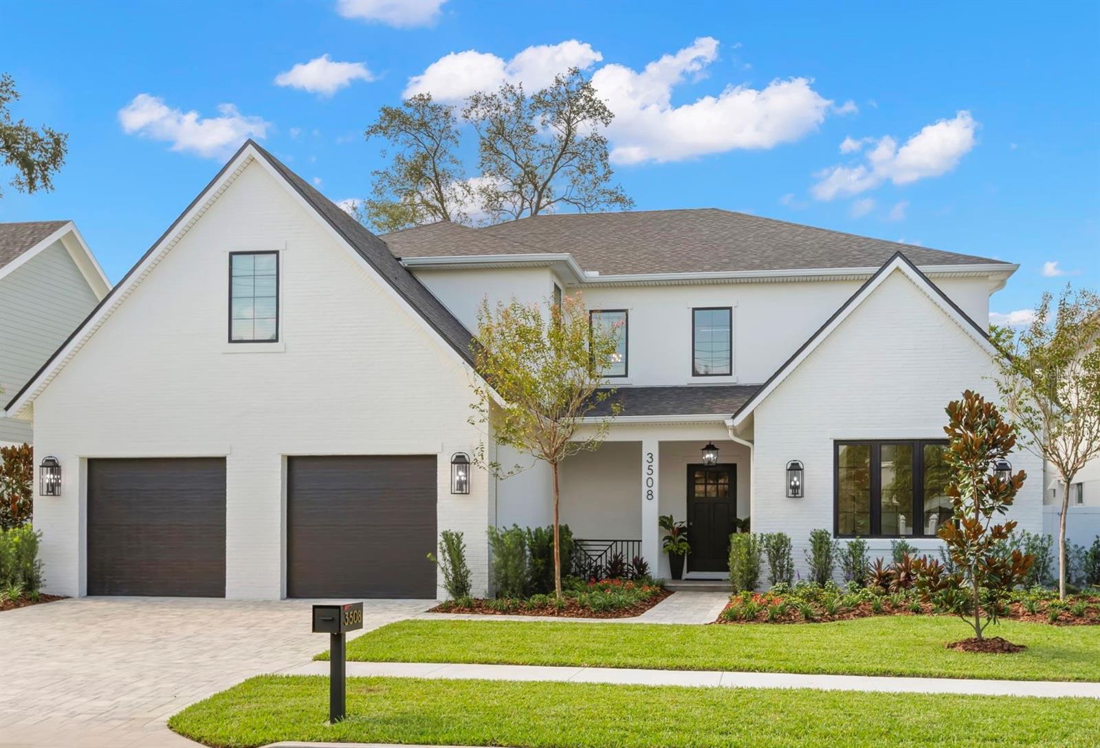 One or more photo(s) has been virtually staged. New construction…Move-in ready! Experience the luxury of this elegant residence located in a highly desirable, quiet neighborhood in South Tampa. This magnificent home sits perfectly on its spacious 75x140 ft lot which is located in a NON-flood zone (flood zone X) and features 2 true Owner’s suites(1 up & 1 down) with dual closets, 5 bedrooms total, 5 full baths and 2 half baths plus a bonus game room with bar, a private study w/ closet for possible 6th bedroom, large screened swimming pool, 2 laundry locations, and a 3-car garage. This expansive 5061 sq ft house is thoughtfully designed for both indoor/outdoor elegant entertaining and everyday comfort. Architectural details throughout include beautiful woodwork and crown moldings, tray ceilings and wide plank engineered wood flooring, smooth drywall, 10 ft ceilings, designer lighting and 8 ft tall solid wood doors illustrate the incredible attention to quality and detail. As you enter this home, you are greeted with an Open Concept living room, gourmet kitchen and dining area. The spacious chef’s kitchen features premium stainless-steel appliances, custom cabinets straight to the ceiling, an oversized island, sleek quartz countertops, under cabinet lighting and a generous butler’s pantry with sink. The expansive great room has a built-in bar, full size wine cooler and a grand feature wall with a linear electric fireplace. Additionally, the main floor also boasts a private office w/ vaulted wood plank ceiling, a large owner's/guest suite retreat with luxurious bath and dual closets. Perfect for guests, in-laws, au pairs, or other shared living. Mudroom by garage includes a stacked washer-dryer for first floor convenience. A wall of pocket sliding glass doors open to seamlessly incorporate this private retreat, featuring a resort-like pool/spa and stunning outdoor kitchen area featuring a grill and fridge…outdoor living at its finest! This amazing oasis features an enormous covered lanai with travertine floors for abundant lounging and sunning areas where the entire family can rest, play, rejuvenate and come together. Upstairs, you will discover the grand owner's suite with 2 custom designed, walk-in closets, a coffee bar with beverage cooler, and a spa- inspired bathroom featuring 6 shower heads, floor to ceiling shower tile, a free-standing tub and dual sinks. The 3 additional bedrooms each have their own bathroom and the generous laundry room comes complete with front load washer & dryer. The residence also offers a full security system & electronics closet for hidden wireless entertainment. It is pre-wired for surround sound, ceiling speakers, has soft close cabinets and drawers, 2 tankless gas water heaters for endless hot water, energy efficient Low-E impact glass windows, plus a 10-year structural warranty. This home is located in the highly sought after A-rated Roosevelt - Coleman-Plant school district. Designed to surpass your expectations of quality, style, and craftsmanship.