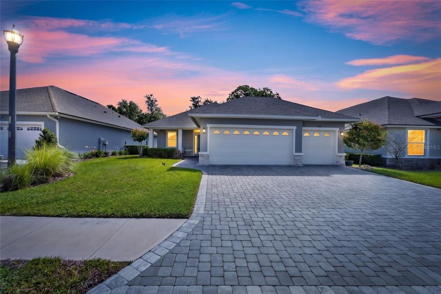 RARE 3-CAR GARAGE + AC-COOLED WORKSHOP SPACE + PRIVATE BACKYARD SETTING IN GATED 55+ LAKE JAMES

This is one of those homes that instantly stands out. A true 3-CAR GARAGE home in Lake James is already hard to find—but this one takes it further with an AIR-CONDITIONED GARAGE, making it perfect for a workshop, hobby space, extra storage, or even golf cart parking year-round. Built in 2022 by Ernie White Construction, this home delivers the benefits of newer construction plus thoughtful upgrades that make everyday living easier, more comfortable, and more enjoyable.

Step inside and you’ll notice the open layout, high ceilings, and soft natural light that fills the main living spaces. The great room feels spacious yet welcoming, with a layout that flows effortlessly for both relaxing and entertaining. Custom cabinet and ceiling paint adds a clean, polished look throughout, giving the home a finished feel that’s hard to replicate.

The kitchen is designed for real life—with a large center island, granite countertops, stainless steel appliances, and plenty of cabinet storage to keep everything organized. Whether you're cooking, hosting, or just enjoying a quiet morning, this space works exactly how you want it to.

The split floorplan offers privacy where it matters most. The front flex room gives you options—home office, den, reading room, or even a potential third bedroom depending on your needs. The primary suite is spacious and comfortable, featuring a large walk-in closet, dual vanities, and a walk-in tiled shower that makes getting ready feel easy and efficient.

Step out back to the SCREENED-IN LANAI overlooking a peaceful, private backyard setting with no direct rear neighbors. This space has been upgraded for low-maintenance living with refreshed landscaping, creating a quiet spot to unwind, entertain, or simply enjoy the outdoors without the upkeep.

This home also comes packed with practical upgrades and added value: PROFESSIONALLY SEALED PAVERS, NEW GUTTERS (FRONT & BACK), FRENCH DRAINS, EXTERIOR FLOOD LIGHTING, and a WHOLE-HOME WARRANTY TRANSFERABLE THROUGH 2027 covering major systems and appliances—providing added peace of mind from day one.

Located inside the gated 55+ community of Lake James, residents enjoy a lifestyle built around convenience and connection. Amenities include a HEATED POOL, clubhouse, fitness center, library, game rooms, and outdoor activities like shuffleboard and bocce ball. The HOA covers lawn maintenance, basic cable, and internet—making it easy to enjoy a LOW-MAINTENANCE lifestyle.

Just minutes from I-4, you’ll have quick access to Tampa and Orlando, plus nearby shopping, dining, medical facilities, and everything Lakeland has to offer.

Homes with a TRUE 3-CAR AC-COOLED GARAGE like this don’t come around often in Lake James—especially with this level of upgrades and care.

Schedule your showing TODAY!