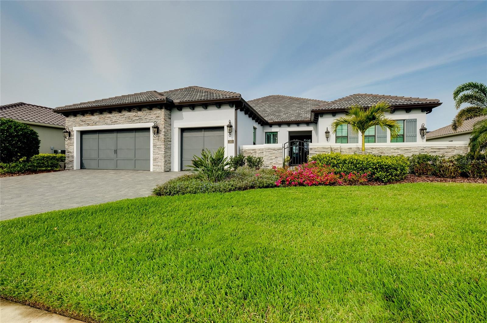 JUST REDUCED ANOTHER $100,000! This stunnly goregous, beautiful Lakefront pool home is LOADED WITH UPGRADES, in the highly sought-after Aria community, Offering nearly 3,000 square feet of exquisite living space and a 3-car garage. Every detail has been thoughtfully designed to combine elegance and comfort.
Step into an inviting floor plan featuring rich wood flooring throughout. The gourmet kitchen is a chef's dream, boasting sleek quartz countertops, Monogram stainless steel appliances, and a spacious island--perfect for entertaining. The master suite is a true retreat, complete with a spa-like en-suite bath and walk-in California Closet.
Enjoy Florida living at its finest with a beautiful lanai and outdoor grill area featuring granite countertops, refrigerator, ice maker and sink; ideal for hosting gatherings. Additional highlights include a Generac whole-house generator system, whole-house water softener system, progressive screens, Sonos system throughout with remote feature for full house control and so much more!!
Aria's exceptional amenities elevate the lifestyle even further, with a state-of-the-art fitness center, resort-style pool and spa, pickleball courts, and a stunning clubhouse. All of this is located close to Venice beaches, historic downtown, and shopping.
Don't miss your chance to own this extraordinary home--schedule your private showing today! *** PLEASE WATCH BOTH VIRTUAL TOURS! ***