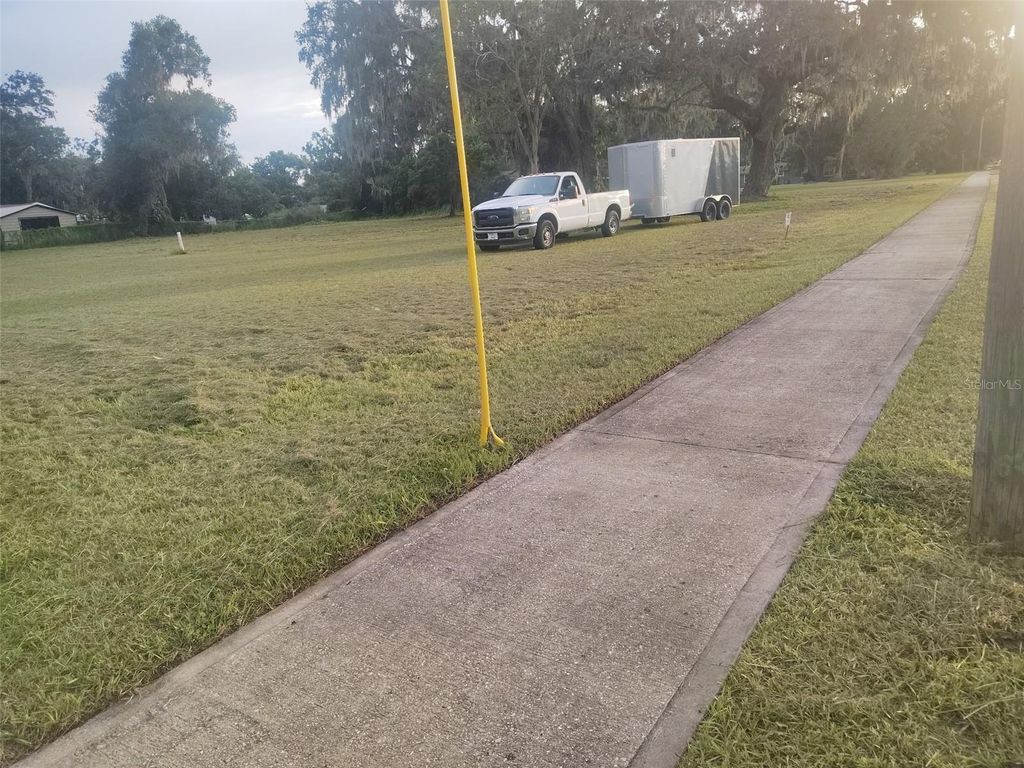 Photo of 722 9th Street NE, Fort Meade, FL 33841 (MLS # L4957640)