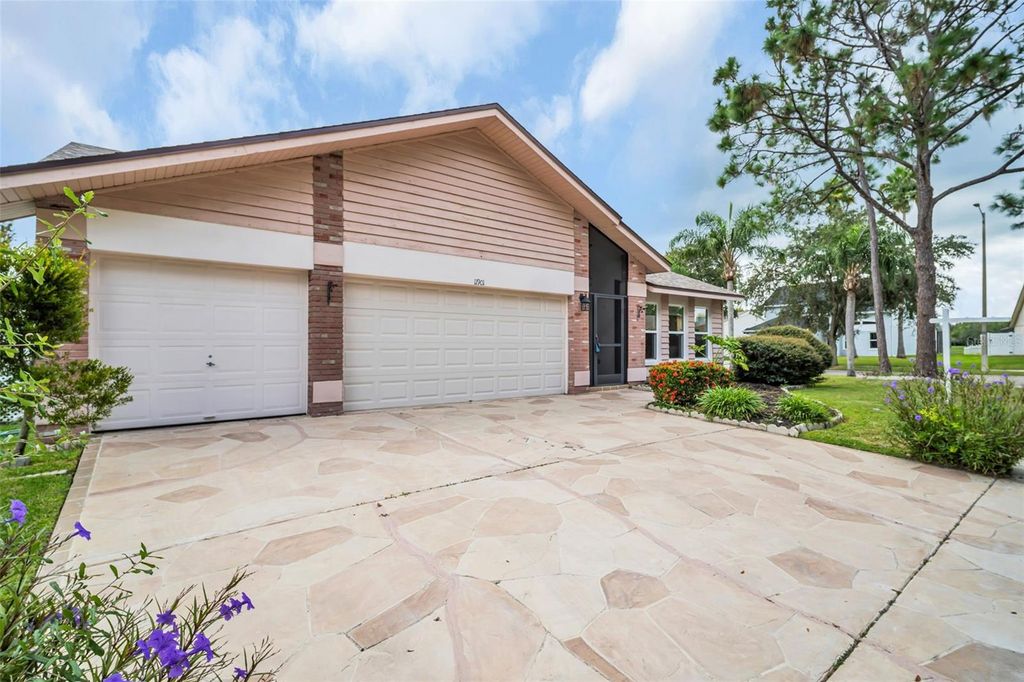 Photo of 11901 Steppingstone Boulevard, Tampa, FL 33635 (MLS # TB8429517)