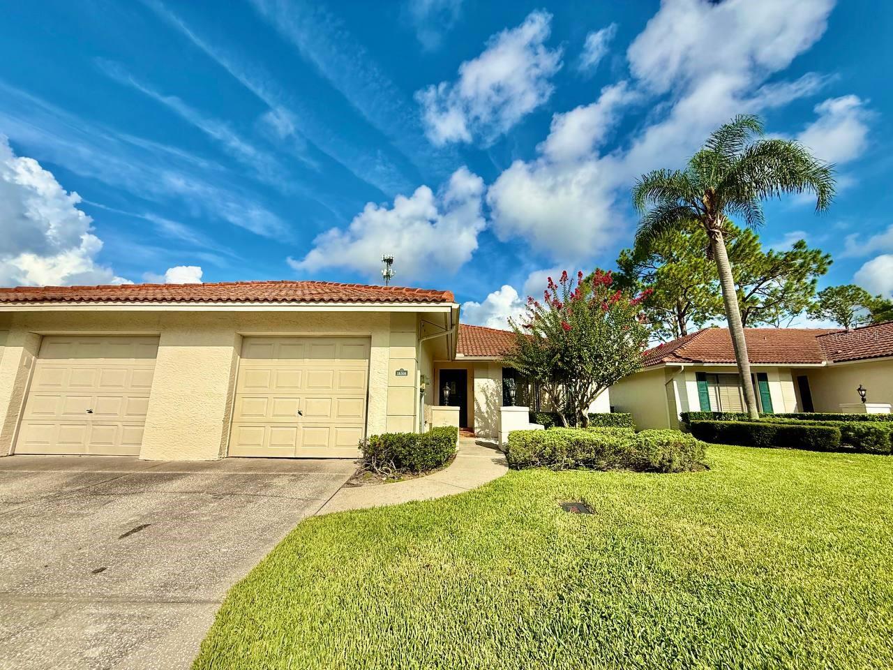 Welcome to this beautifully maintained 2-bedroom, 2-bath villa with a one-car garage, located in the desirable community of Pebble Creek in Tampa Palms. This home features an open floorplan with wood-look laminate flooring throughout and ceiling fans in every room for year-round comfort. The spacious living area is highlighted by a decorative fireplace, creating a cozy and inviting atmosphere. The kitchen offers granite countertops, ample cabinetry, and a functional layout perfect for cooking and entertaining. Glass sliders lead out to your private, screened-in patio an ideal space to enjoy your morning coffee or unwind with a book while taking in the peaceful outdoor surroundings. The primary suite includes a walk-in closet and a well-appointed en-suite bathroom. The secondary bedroom and bath provide flexibility for guests, a home office, or additional living space. Washer and dryer included for your convenience. Conveniently located near top-rated schools, shopping, dining, and major roadways, this villa offers the perfect combination of comfort, style, and convenience. Don't miss your opportunity to live in one of Tampa Palms most sought-after communities schedule your private showing today! In addition to the advertised base rent, all residents are enrolled in the Resident Benefits Package (RBP) for $50.00/month which includes HVAC air filter delivery, credit building to help boost your credit score with timely rent payments, utility concierge service making utility connection a breeze during your move-in, and much more! More details upon application. Sorry, no pets. Vacant and Available now!