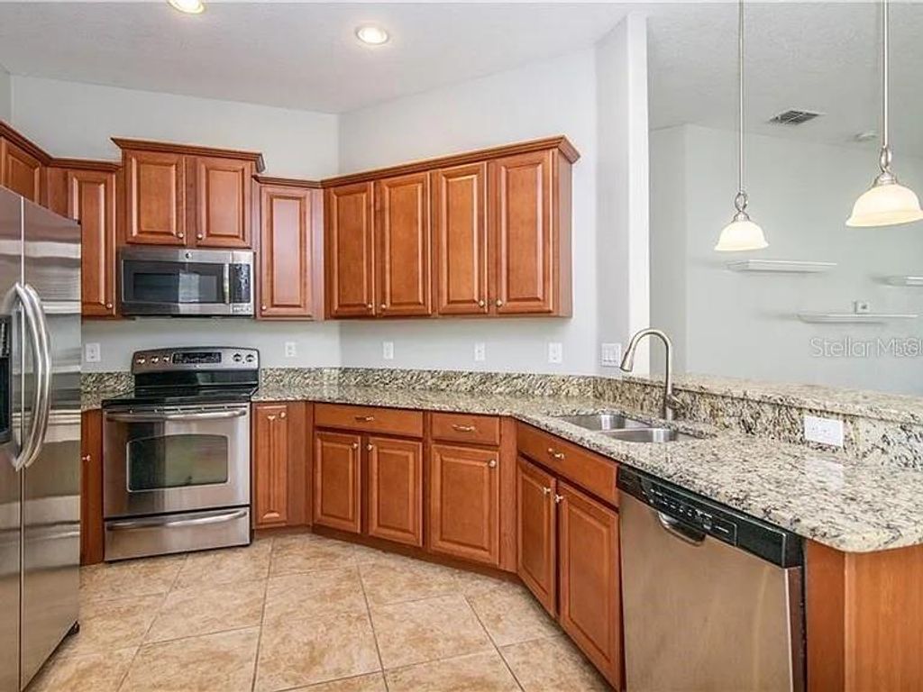 Photo of 10019 Newminster Loop, Ruskin, FL 33573 (MLS # TB8466327)