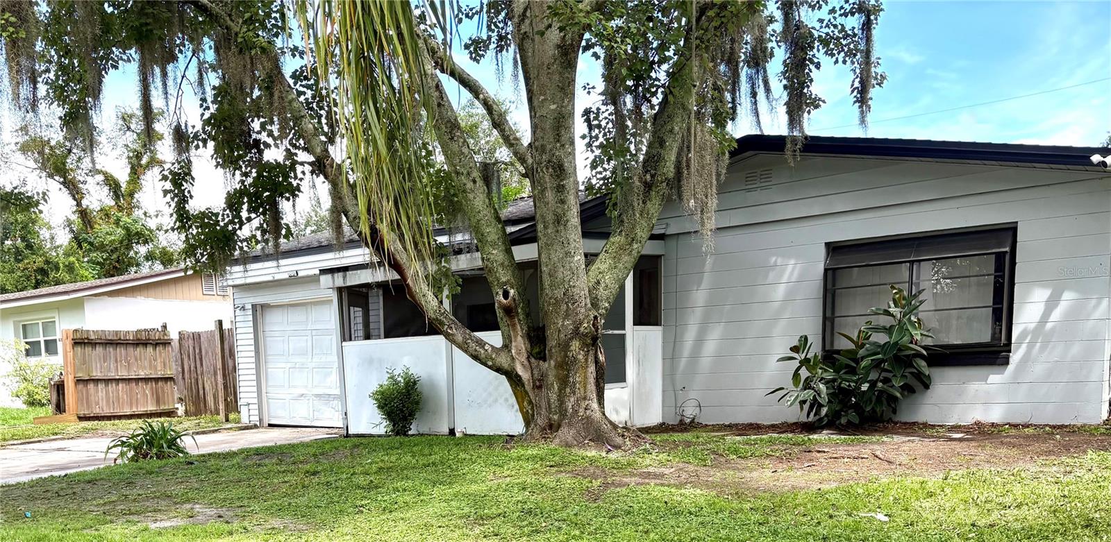 Okland Hills Altamonte Springs. This cozy, block built single family home with 3 bedrooms, 1 bath and a spacious front enclosure can be a great investment opportunity for first time home buyers or for someone who is looking to rent it or flip it. It has a HUGE backyard with a built-in shed. The roof was replaced in May of 2019. It has ceramic tile throughout the common areas and new carpet in the bedrooms.