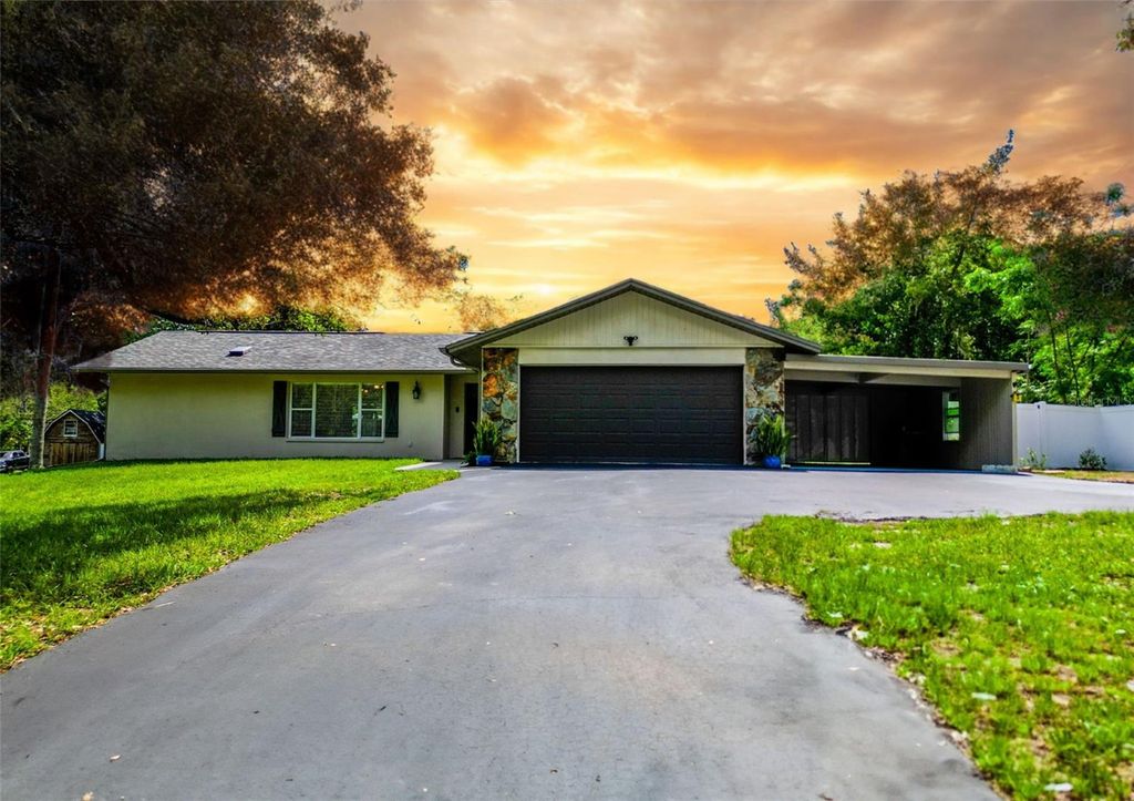 Photo of 7211 Red Oak Loop, New Port Richey, FL 34654 (MLS # TB8396063)
