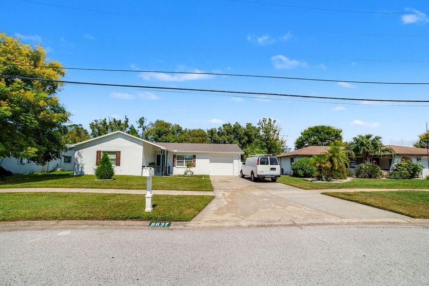CLIENT MOTIVATE...NO FLOOD ZONE Beautiful 3BR/2BA single family home with new roof (2024), new AC (OCTOBER 2025), new hot water heater (2025) and bonus room that can be used as study or possible 4th bedroom.  Nestled in pleasant Viva Villas area of Hudson, with water filtration (in the kitchen) and lawn irrigation (front/rear).  This home features tile floors throughout in the spacious living/dinging area with gleaming kitchen with tons of cabinets, gorgeous counters, and plenty of working space for prepping and cooking those delicious meals. The bedrooms are generosity sized with lots of closed space and natural light.  Bathrooms have been updated with newer fixtures and lighting and the garage features some extra storage and washer/dryer ready for the new owner's convenience.  Don't miss this opportunity to live your Florida dream!  Call now to schedule your appointment and make this home yours today!!