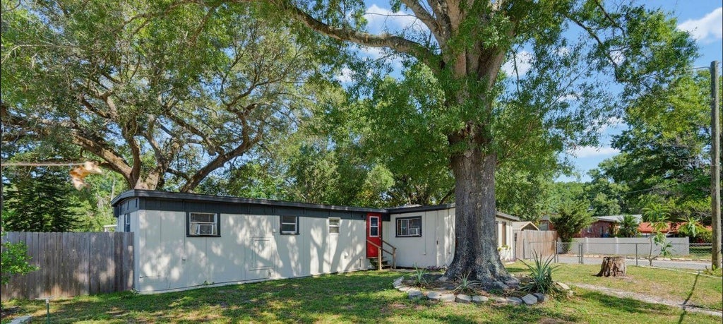 Photo of 4106 Wedgemere Drive, Tampa, FL 33610 (MLS # TB8554228)