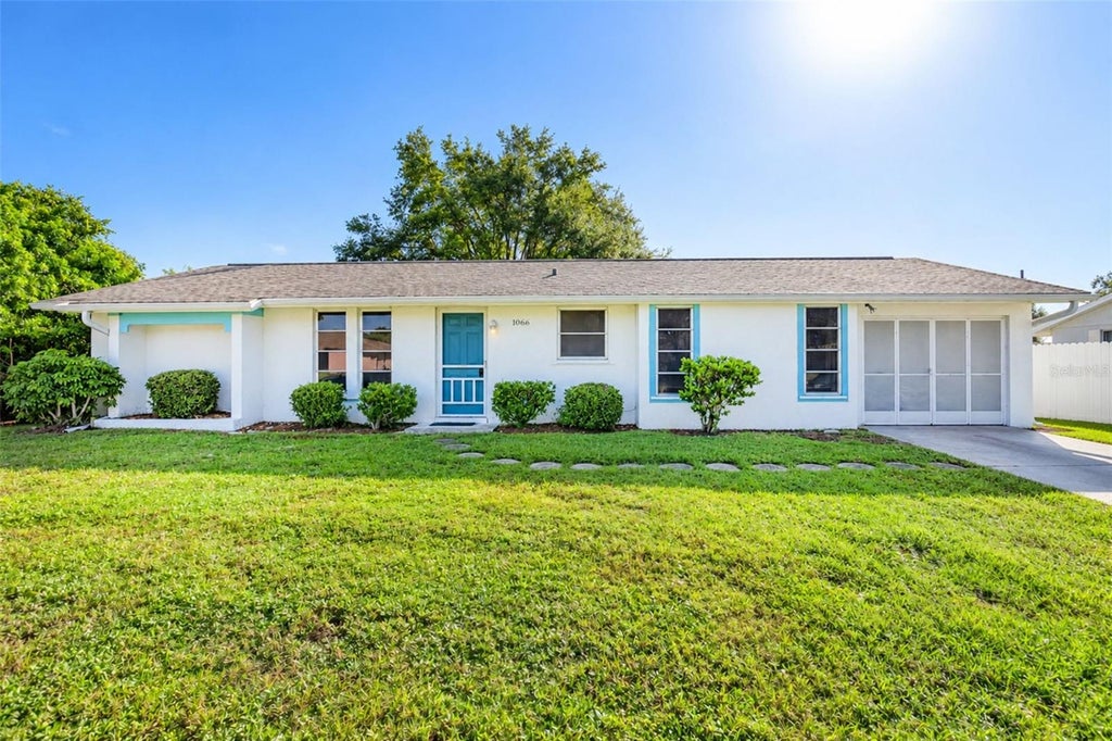 Photo of 1066 Fletcher Street, Port Charlotte, FL 33952 (MLS # D6149247)