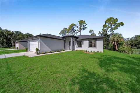 Photo of 73 Flamingo Boulevard, Port Charlotte, FL 33954 (MLS # TB8404539)