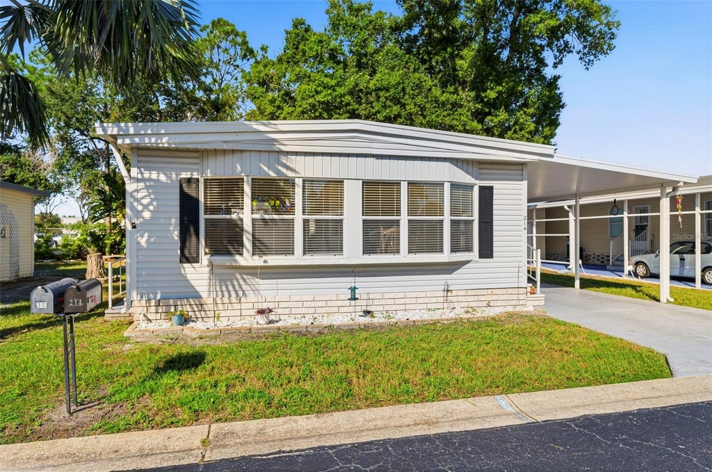 Photo of 12501 Ulmerton Road #214, Largo, FL 33774 (MLS # TB8559610)
