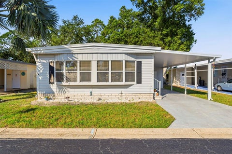 Photo of 12501 Ulmerton Road #214, Largo, FL 33774 (MLS # TB8559610)