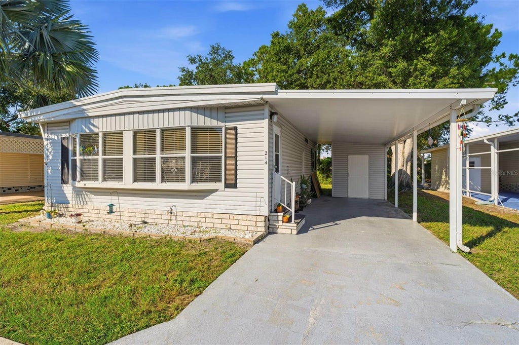 Photo of 12501 Ulmerton Road #214, Largo, FL 33774 (MLS # TB8559610)