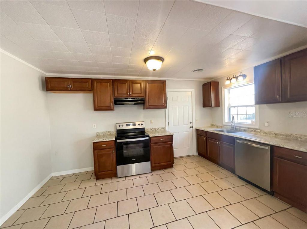 Photo of 830 Shady Lane, Bartow, FL 33830 (MLS # O6382241)