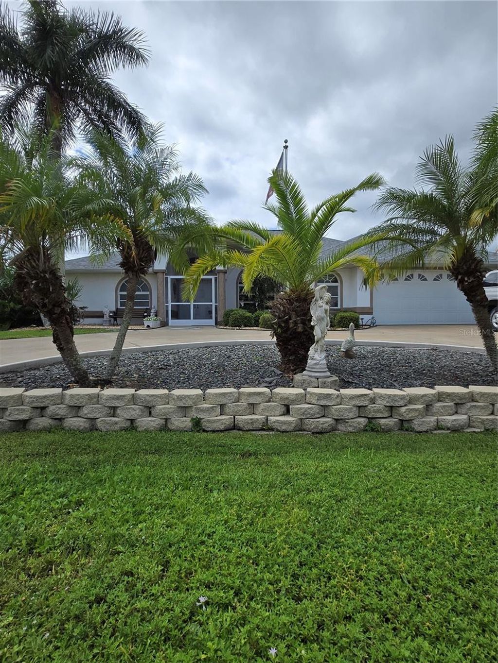 Photo of 7047 N Plum Tree, Punta Gorda, FL 33955 (MLS # C7517989)